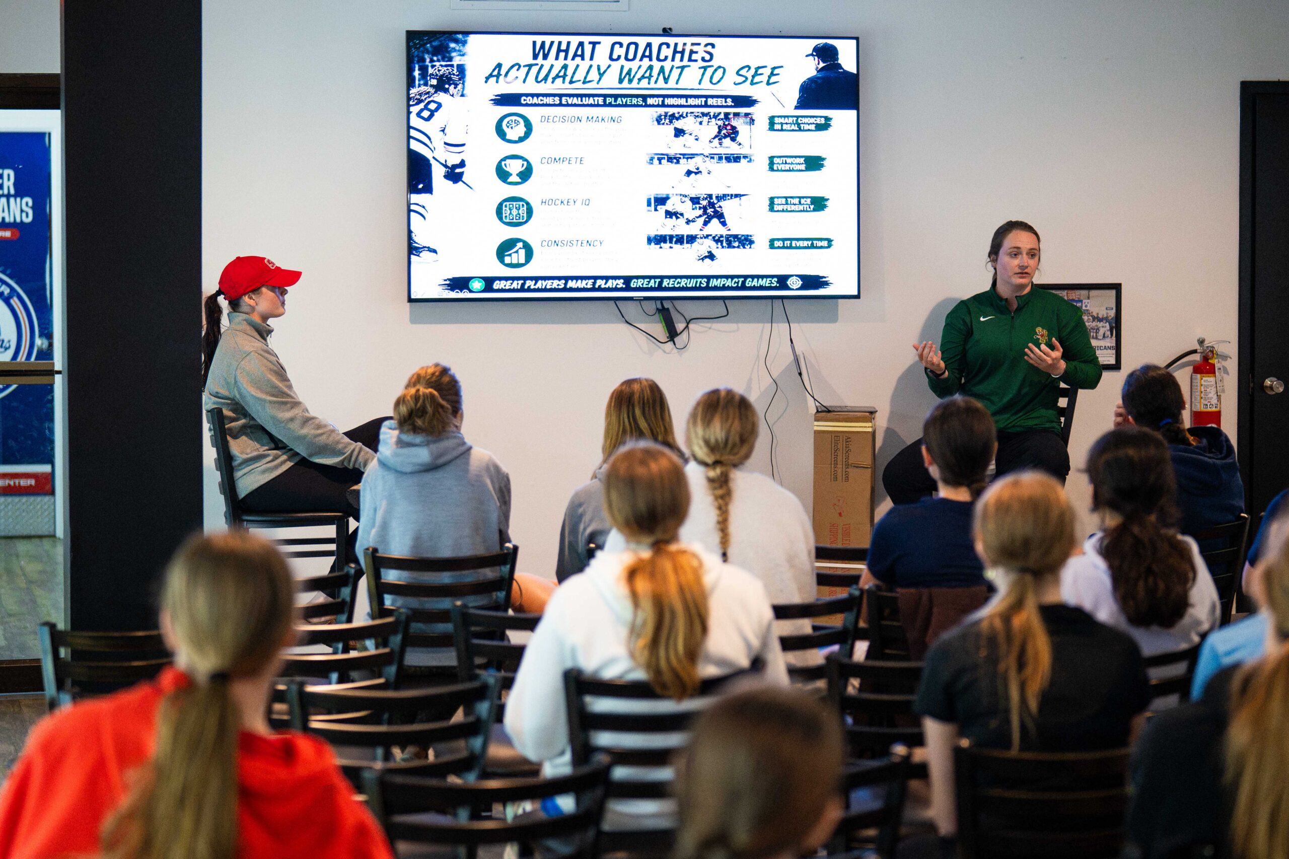 Coach presenting on what college coaches want to see